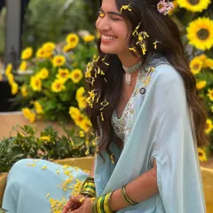 This picture is pure sunshine. My bride Serena during her Haldi in Goa, surrounded by marigolds and just radiating happiness. This is the kind of natural, joyful glow I love to create.