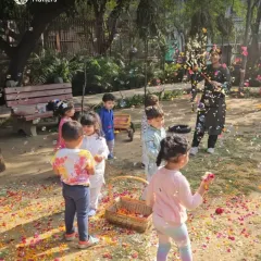 Celebrating Holi with a shower of flower petals is a beautiful, gentle, and sensory-rich experience. It connects children to nature and tradition, filling the air with fragrance, color, and laughter.