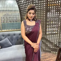 This angle shows the soft, flattering makeup and how it complements her entire look, making her feel confident and ready for the event.