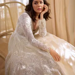 A full-length shot from the HT City Showstoppers editorial. The flowing ivory skirt and detailed jacket created a look that was both glamorous and gracefully understated.