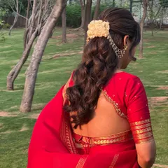 The full look in a beautiful garden setting. This hairstyle is perfect for a daytime wedding or outdoor event.