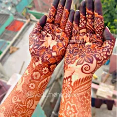 The beautiful, deep reddish-brown stain of my natural henna paste, captured in the sunlight. This is the result after the paste has been removed, showing the quality and richness of color you can expect for your special day.