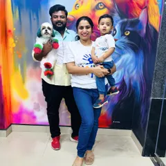 Another happy family moment from our Holi celebration at the salon. We believe pets are family, and seeing them included in special occasions with a fun, colorful look is what we are all about.