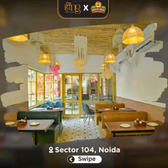 A view of our stylish and comfortable restaurant seating area. It's a proper dining space where adults can relax and enjoy their meal while the kids play.