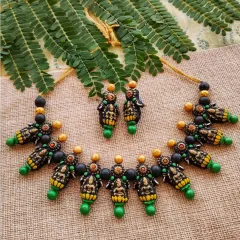 Inspired by the grandeur of South Indian temple jewelry, this Mahalakshmi motif necklace is designed for special occasions. I use an antique gold finish and green accents to give it an authentic, ethnic feel.