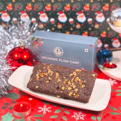 For the chocolate lovers, we created a Brownie Plum Cake for Christmas. It combines the fudgy texture of a brownie with the festive flavors of a traditional plum cake.