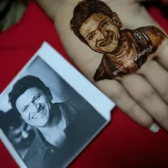 To show the precision of my portrait work, here is a henna tribute I created next to the original photograph. Capturing a likeness and an expression like this takes years of practice. It's a skill I pour my heart into.