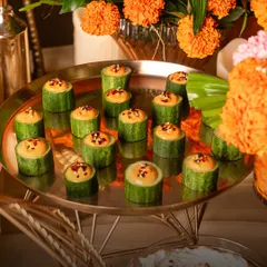 A healthy and refreshing appetizer option. These Paprika Hummus in Cucumber Canapés are light, crunchy, and add a beautiful pop of color to any grazing table.
