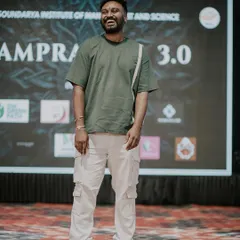 A happy, candid moment on stage at the Soundarya Institute of Management and Science event.