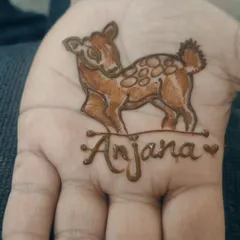 A special request for the groom. This adorable baby deer with the bride's name, Anjana, is such a sweet and personal touch.