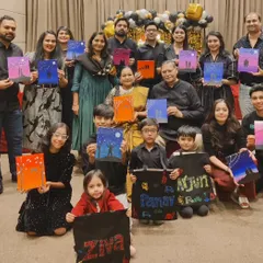 Art has a beautiful way of connecting generations. For this family's 50th wedding anniversary, everyone from grandparents to grandchildren painted together. They created silhouette canvases and personalized tote bags, turning a milestone celebration into a shared creative memory.