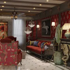 This living room is a perfect example of our "more is more" maximalist design philosophy. We've layered rich textures, bold red fabrics, and classic art pieces, including a statement console with ornate golden legs, to create an opulent space.