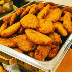 A close-up of our Bhetki fish fry, a testament to our expertise in Bengali cuisine. The golden-brown crust is achieved by frying to perfection, making it an irresistible appetizer.