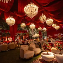 We transformed this space into a royal darbar for a soulful Sufi night. Draping the ceiling in deep crimson fabric and hanging dozens of crystal chandeliers created an atmosphere of intimate opulence, perfect for an evening of mystical music and celebration.
