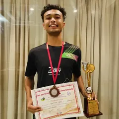 SDBA’s Ayushmaan Nagari proudly displaying his bronze medal and trophy from the Uttarakhand State Junior & Senior Championship. His success in men's doubles highlights our specialized doubles program.