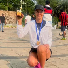 This is what it's all about. The smile of a runner who has pushed her limits and achieved her goal. I am privileged to witness these moments of triumph, whether it's a podium finish or a new personal best.