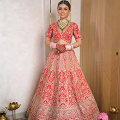 Every detail matters in creating the perfect bridal look. This full-length shot showcases how the makeup, hair, and stunning red lehenga come together to create a cohesive and breathtaking vision of a modern Indian bride.