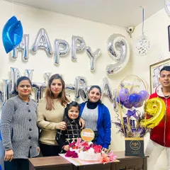 A happy moment with my family and team as we celebrate our 9th anniversary. Their support is my greatest strength.