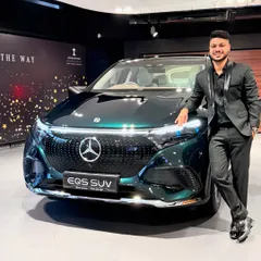Posing with the stunning Mercedes-Benz EQS SUV. Performing for a brand synonymous with luxury and performance is always a thrill, and this was one of 14 incredible shows I've done with them.