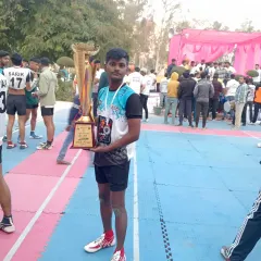 One of our proud players holding the second-place trophy from the Unique Kabaddi League in Haryana. Every tournament is a learning experience that builds stronger athletes.