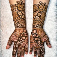I love combining different styles, like in this full-arm design where bold floral roses meet delicate traditional patterns. The contrast between the dark-filled areas and the intricate line work makes the design pop.