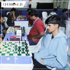 A close up shot of a young player during a tense moment in the KSCA and BUDCA collaborative tournament. Our events provide a serious and professional environment for competitive chess.