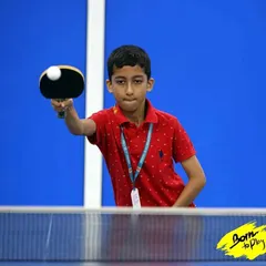 A perfect action shot of a student executing a forehand topspin during a match. My training emphasizes not just learning the strokes, but knowing when and how to use them effectively in a competitive setting.