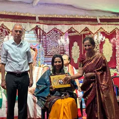 A cherished moment being presented with the award plaque by the Sree Ramaseva Mandali trust during their Ramanavami celebrations in Chamarajpet.