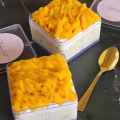 A closer look at the tropical bliss of my Alphonso Mango Tres Leches. The soft sponge is soaked in a blend of three milks and topped with fragrant, sweet Alphonso mangoes.