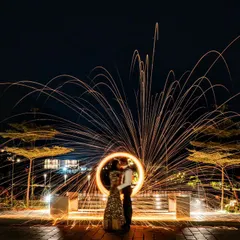 We live for creating moments of pure magic. This stunning light-painting portrait of Prerna and Viraj at Amita Rasa captures the spark of their new beginning, a testament to how we frame love stories against spectacular backdrops.