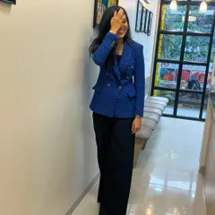 A candid moment at my clinic. While I take my work very seriously, I strive to create a warm and approachable atmosphere for all my patients.