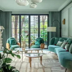 A look inside the Elle Decor feature on Summer Haus, showcasing the vibrant yet serene living room we helped create. The design balances bold color choices with sophisticated forms and textures.