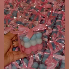 Another look at the pink and blue bubble candles, all packaged and ready to go for a baby shower. The clear box and pink ribbon make for a sweet presentation.