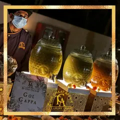Our elegant Gol Gappa setup features illuminated honeycomb glass jars for our flavored waters. This presentation is designed to be both classy and minimalistic, ensuring the focus remains on the authentic, royal taste of the chaat.