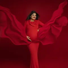 The magic of flowing fabric. I use drapes and movement to add a sense of life and energy to my portraits, turning a simple pose into a dynamic work of art. This shot in a vibrant red gown captures that feeling perfectly.