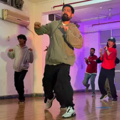Leading the class through a routine. You can see the energy and synchronization as we all move together to the beat.