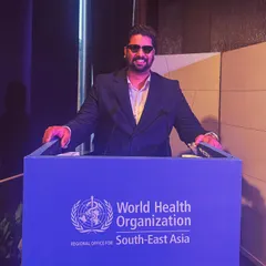 At the podium during the World Health Organization conference. It was a privilege to stand before global health leaders and use my art to advocate for a cause that affects all of humanity.