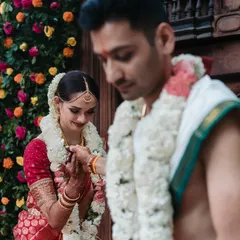 A tender moment during the wedding ceremony as the groom ties the 'mangalsutra'. Our decor aims to enhance the sanctity of these rituals.