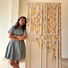 Standing proudly next to the finished floral almirah. This project shows how even a heavy, old metal piece can become a work of art that preserves memories.