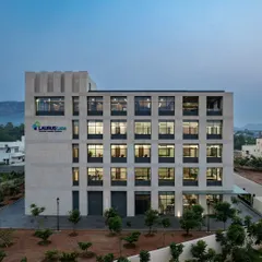 The Laurus Labs regional office in Vizag, set against a backdrop of hills, was designed for natural cross-ventilation, allowing it to function without air conditioning.