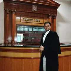 Pictured here at the Karnataka High Court. I am familiar with the workings of various high courts, allowing me to effectively represent clients across different jurisdictions.