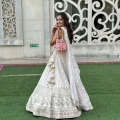 A playful shot showing the back of the lehenga and the unique draping style.