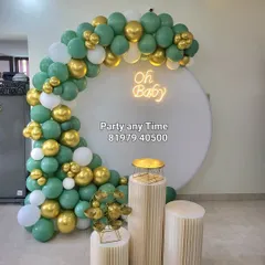 A modern and stylish baby shower decoration using sage green, white, and gold balloons. This color palette is perfect for a gender-neutral celebration.