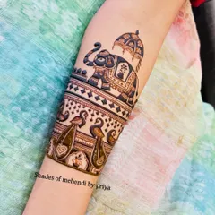 A close-up of a royal elephant motif on the forearm. This is a classic element in bridal and traditional mehendi, symbolizing strength and good fortune.