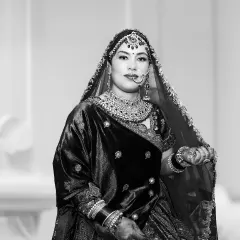 A classic black and white version of a bridal portrait. This style gives the photo a timeless, elegant, and dramatic feel.