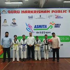 My students and I at the ASMITA Khelo India Taekwondo event. It is always rewarding to see them recognized for their skills.