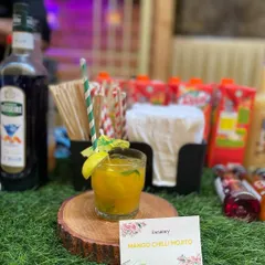 A perfect blend of sweet and spicy, our Mango Chilli Mojito is a crowd favorite. This mocktail is a great way to welcome guests and add a zesty kick to your corporate event or party.