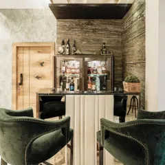 A close-up of the bar from image 88, highlighting the rich textures and sophisticated materials.