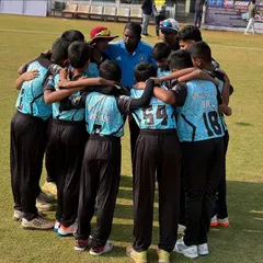 Another powerful team huddle, showing the unity and spirit of our young cricketers before a crucial match in the N.J. Trophy tour.