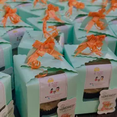 A large corporate order of our vanilla buttercream cupcakes. Each cupcake is individually boxed with our branding, making them perfect for office farewells, celebrations, or client gifts.